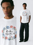 The Wreath of Wildflowers Tee - White Snow Fabric with Hand-Drawn Floral Circle & Logo