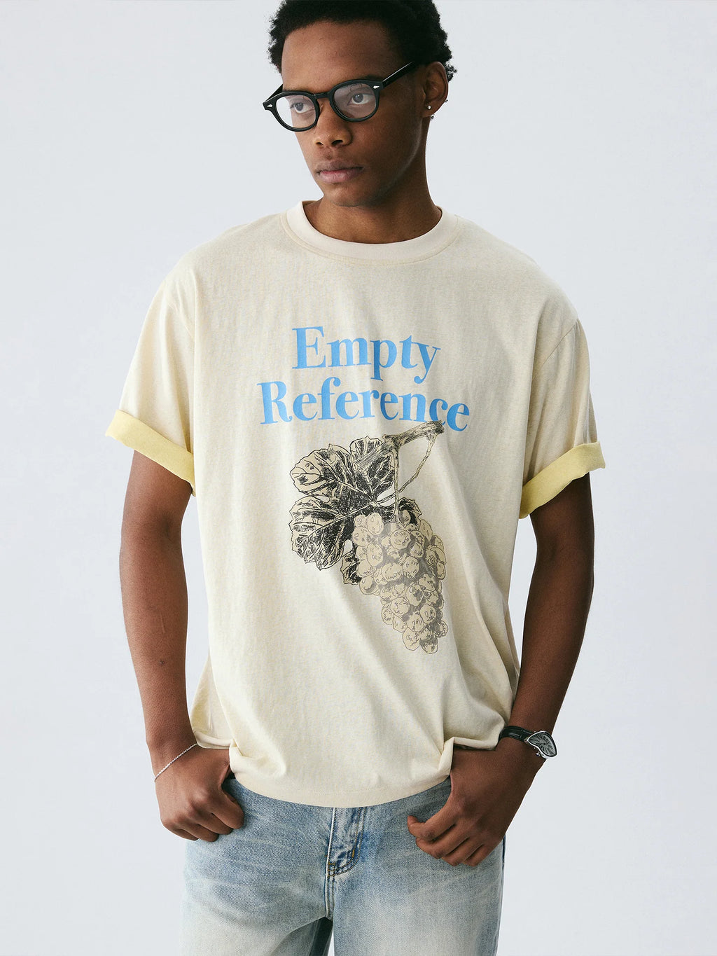 The Sketch Grape Bunch Tee - Apricot Snow Fabric with Charcoal-Style Grape Cluster & Blue Logo