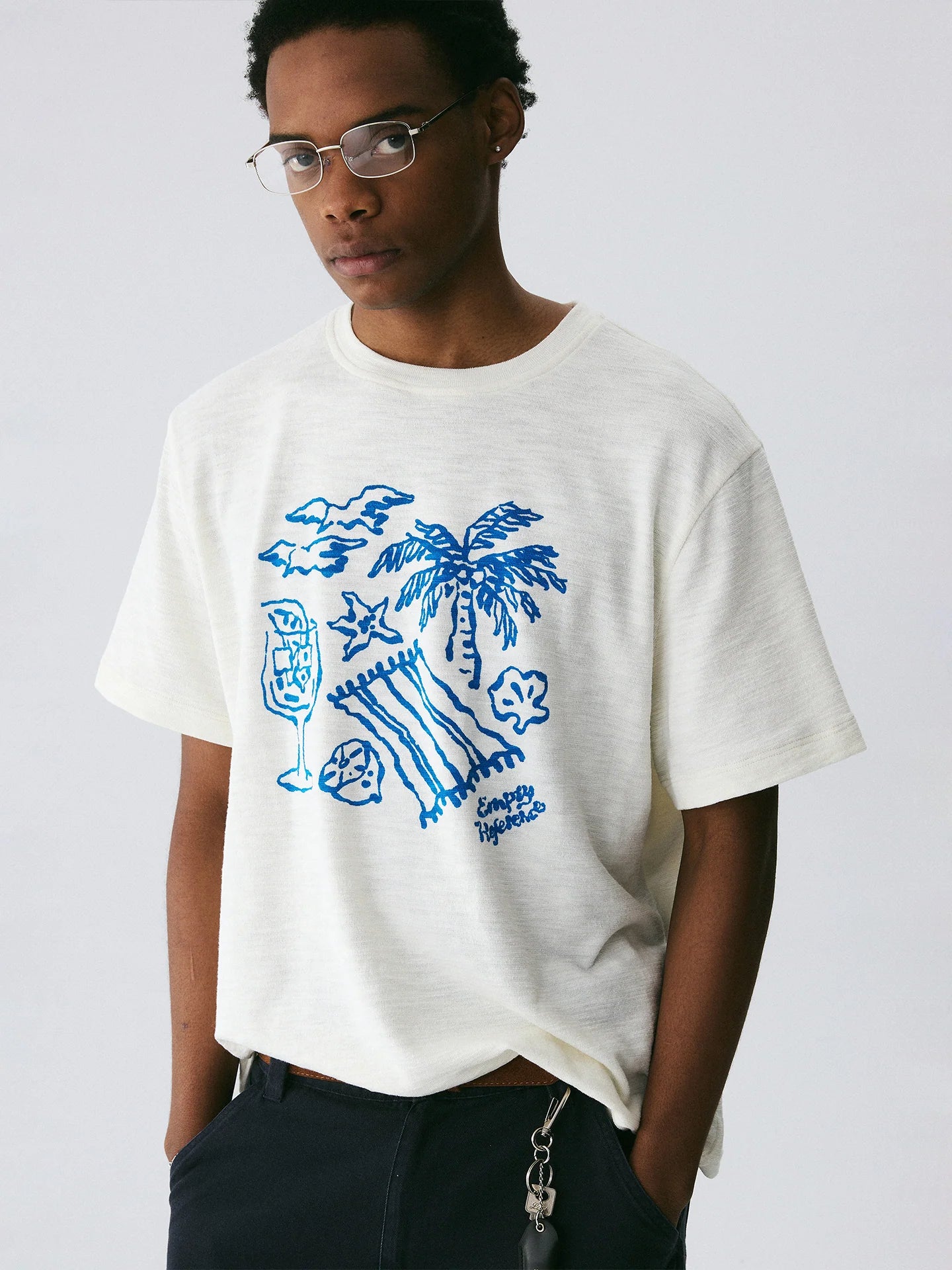 The Coastal Sketch Tee - Textured Slub Cotton with Hand-Drawn Beach Scene