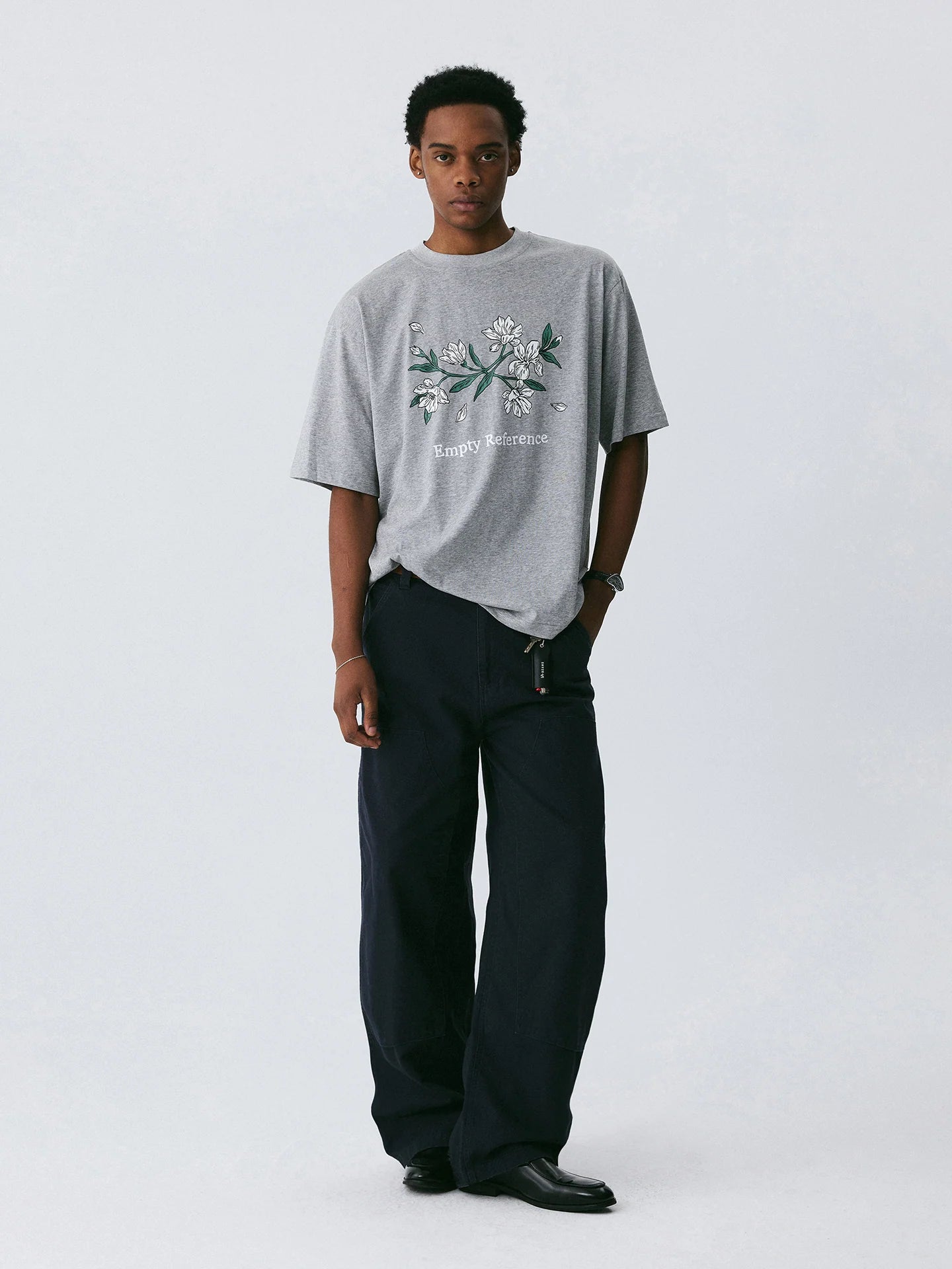 The Snowfall Sakura Tee - Textured Snow Fabric with Hand-Drawn Cherry Blossom