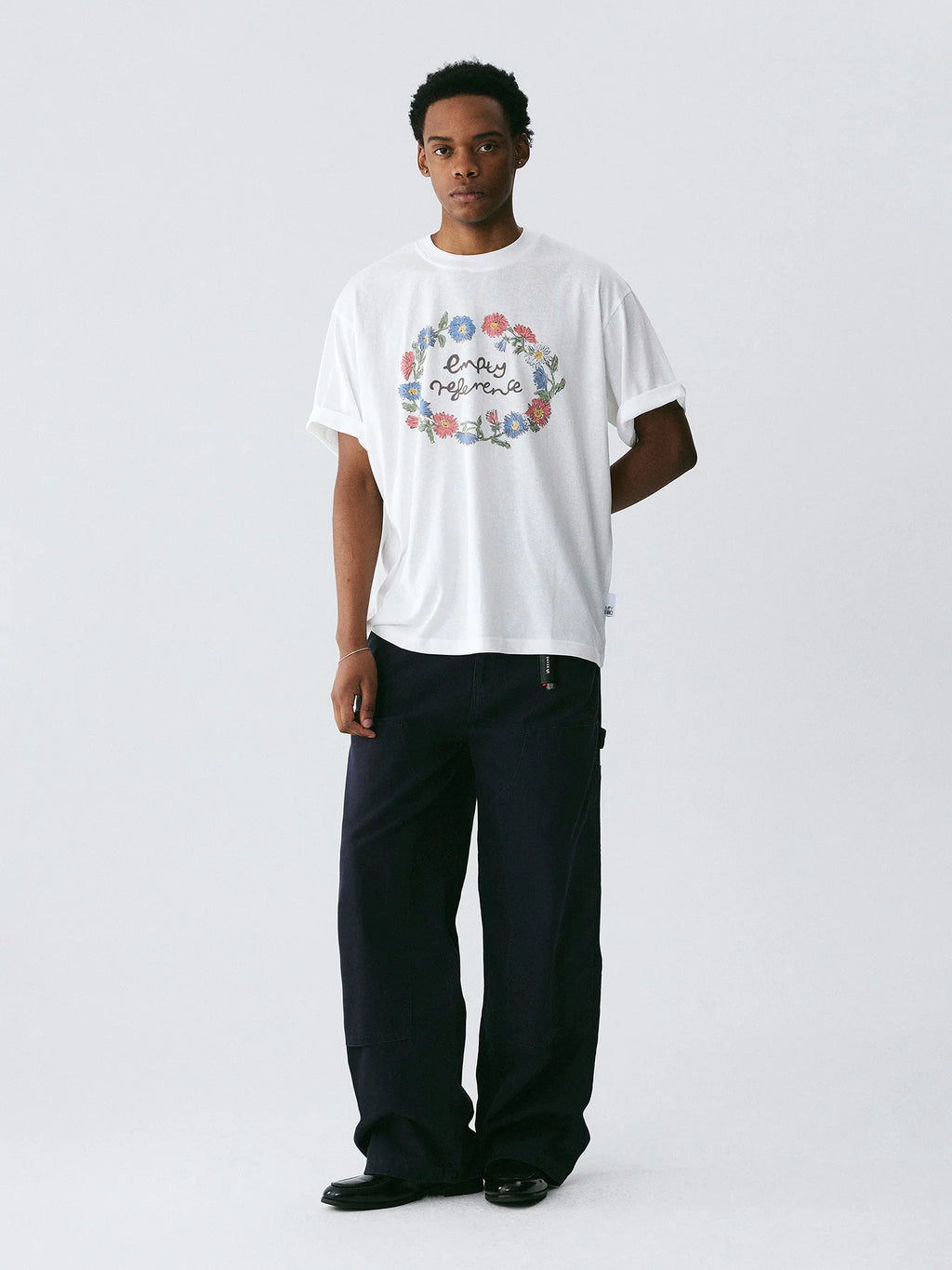 The Wreath of Wildflowers Tee - White Snow Fabric with Hand-Drawn Floral Circle & Logo