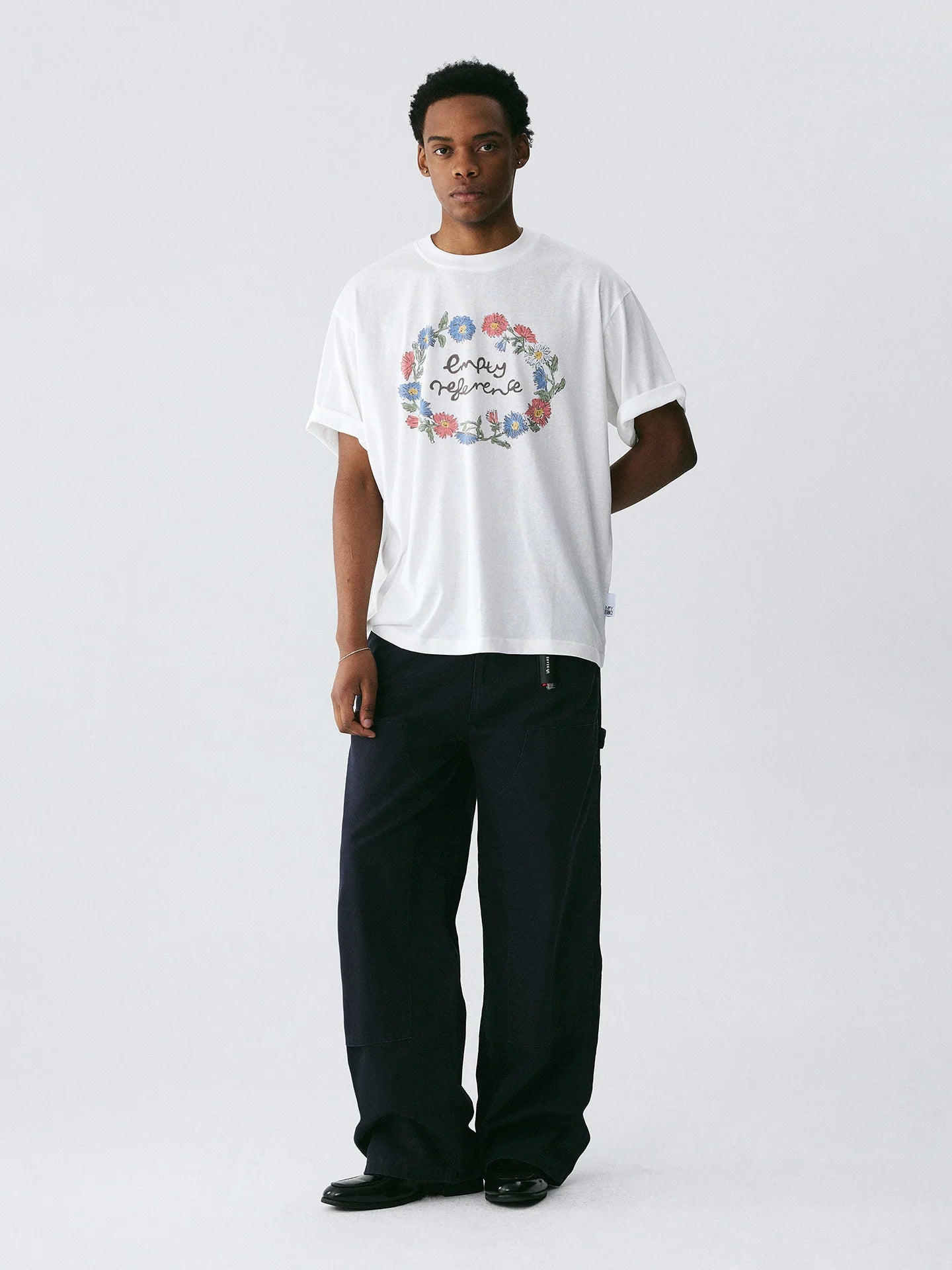 The Wreath of Wildflowers Tee - White Snow Fabric with Hand-Drawn Floral Circle & Logo