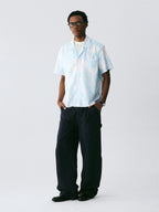 The Scattered Petal Shirt - Sky Blue Full-Print with Hand-Drawn White Flowers