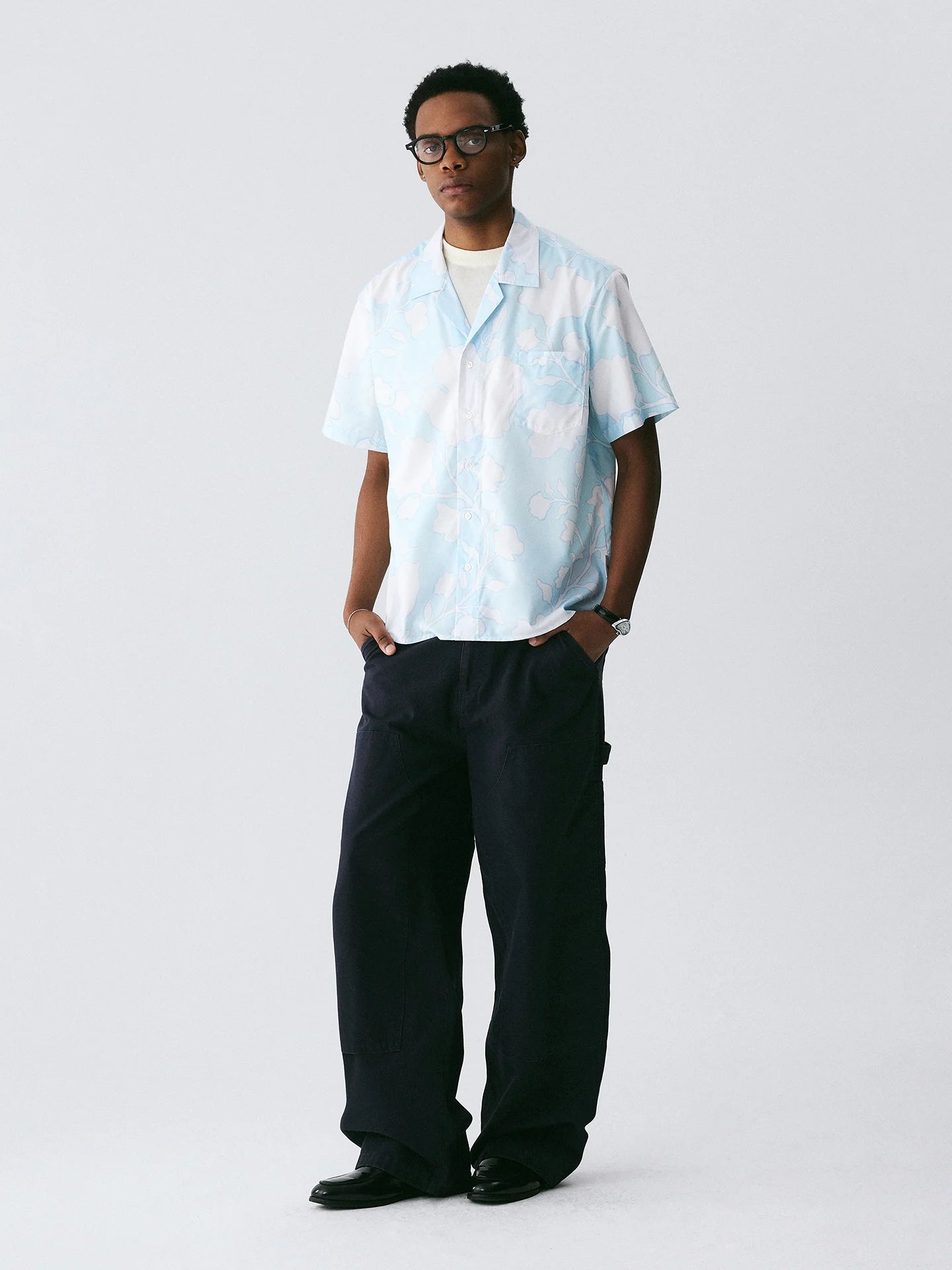 The Scattered Petal Shirt - Sky Blue Full-Print with Hand-Drawn White Flowers