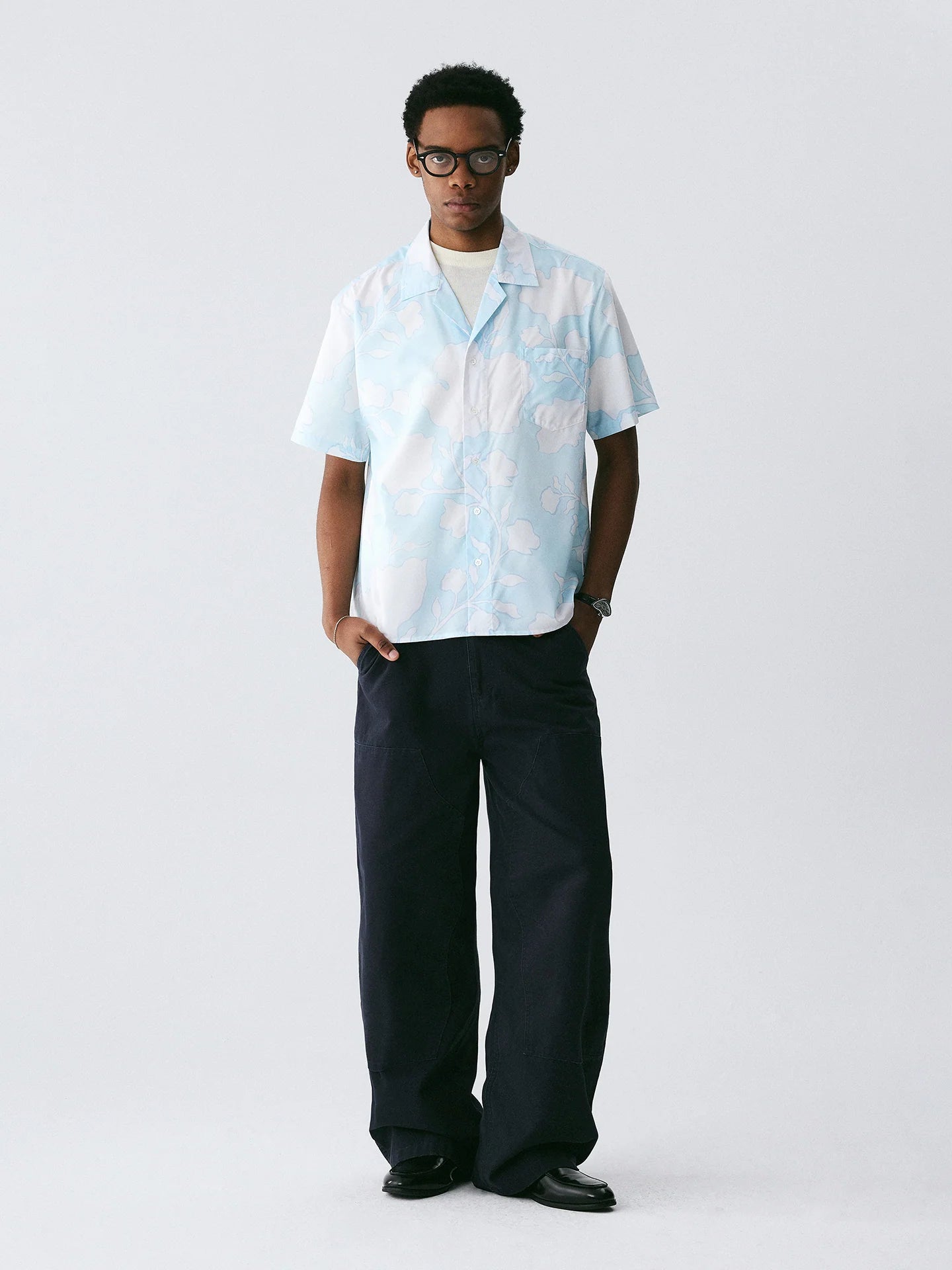 The Scattered Petal Shirt - Sky Blue Full-Print with Hand-Drawn White Flowers