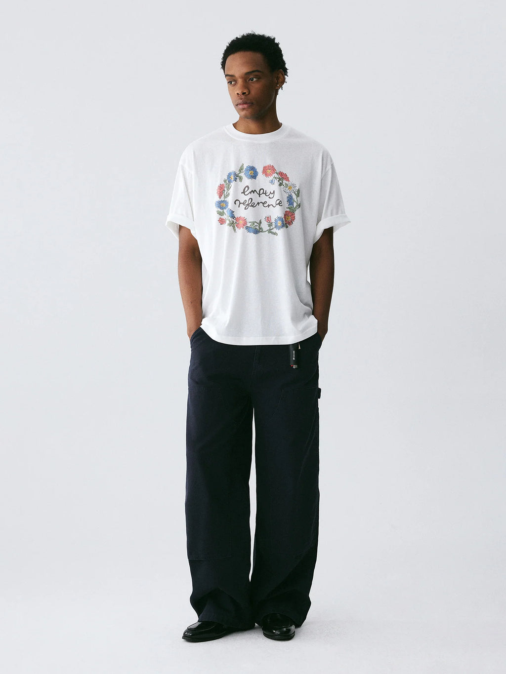 The Wreath of Wildflowers Tee - White Snow Fabric with Hand-Drawn Floral Circle & Logo