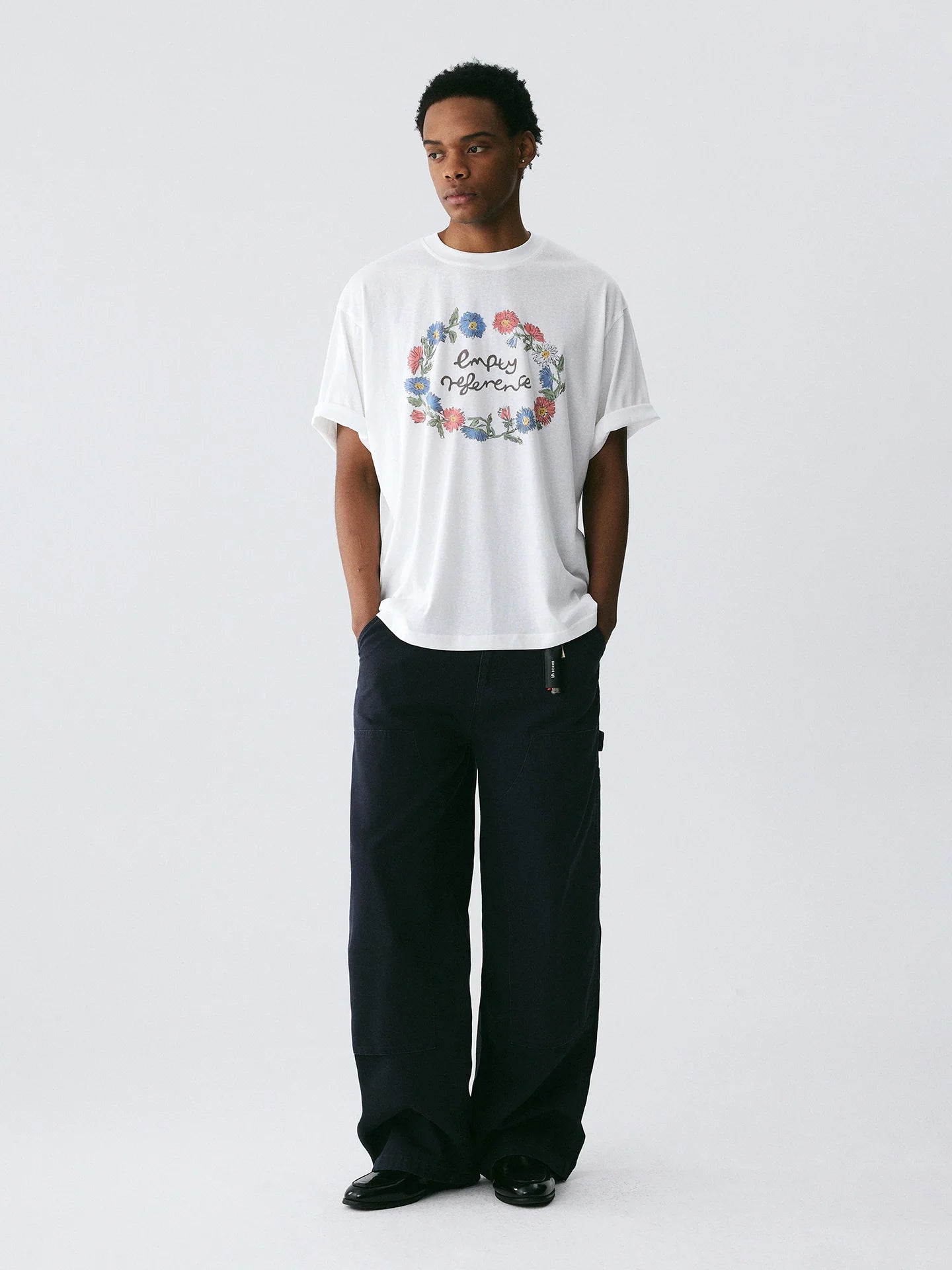 The Wreath of Wildflowers Tee - White Snow Fabric with Hand-Drawn Floral Circle & Logo